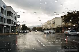 Cold Front Sweeps South Africa: Rain, Snow, Wind & Fire Warnings wet street scene in Cape Town CBD