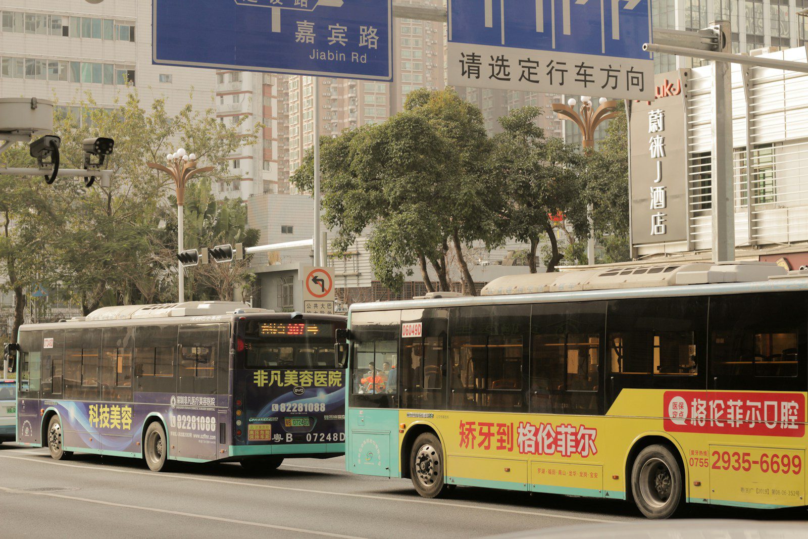 CaetanoBus to Supply 30 Electric Buses to Porto, Boosting Sustainable Urban Transport a couple of buses that are sitting in the street