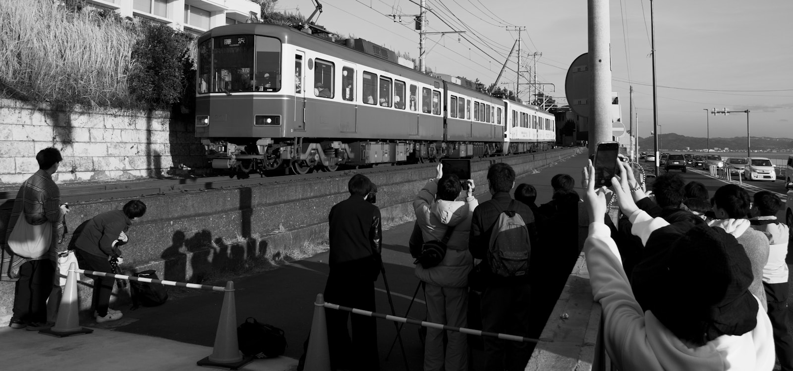 Mombasa Commuter Rail train arriving at station with passengers boarding